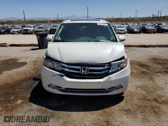 2015 Honda Odyssey Touring Elite z VIN 5FNRL5H91FB053430, wystawiony jako Copart lot #55276315 z przebiegiem 96 667 mil mil oraz Szkoda całkowita • Salvage title. Historia ofert i sprzedaży dostępna na DreamBid. Obrazek 5.
