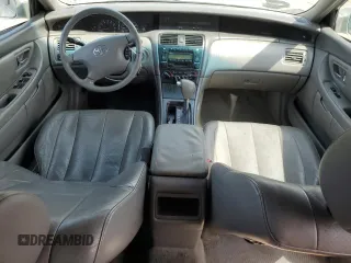 2004 Toyota Avalon XL z VIN 4T1BF28B14U377665, wystawiony jako Copart lot #55421495 z przebiegiem 174 323 mil mil oraz Szkoda całkowita • Salvage title. Historia ofert i sprzedaży dostępna na DreamBid. Obrazek 8.