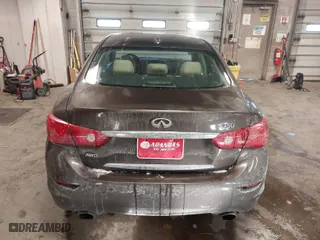 2014 Infiniti Q50 Hybrid Premium with VIN JN1AV7AR3EM702182, listed as a IAAI auction lot 41577667 with 61,599 mi miles. Bid and sale history available at carsss.com. Image 16.