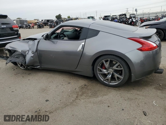 2013 Nissan 370Z with VIN JN1AZ4EH0DM384010, listed as a Copart auction lot 77851724 with 79,101 mi miles and Salvage Title. Bid and sale history available at carsss.com. Image 2.