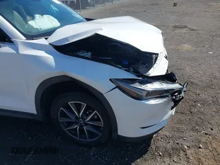 2018 Mazda CX-5 Grand Touring with VIN JM3KFBDM0J0404635, listed as a IAAI auction lot 41883068 with 71,178 mi miles. Bid and sale history available at carsss.com. Image 18.