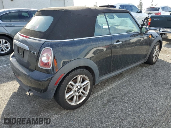 2012 MINI Convertible with VIN WMWZN3C59CT135270, listed as a Copart auction lot 48468785 with 81,726 mi miles and Clean Title. Bid and sale history available at DreamBid. Image 3.