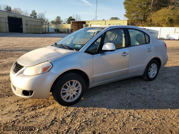 2012 Suzuki SX4 LE with VIN JS2YC5A38C6300439, listed as a Copart auction lot 85121124 with 74,324 mi miles and Clean Title. Bid and sale history available at carsss.com. Image 1.