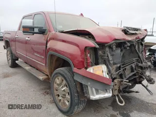 2019 GMC Sierra 2500HD Denali with VIN 1GT12SEYXKF218861, listed as a IAAI auction lot 41176336 with 130,225 mi miles. Bid and sale history available at carsss.com. Image 1.