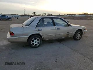 1990 Nissan Stanza GXE z VIN JN1FU21P9LX822087, wystawiony jako Copart lot #82967984 z przebiegiem 109 985 mil mil oraz Tytuł czysty. Historia ofert i sprzedaży dostępna na DreamBid. Obrazek 3.