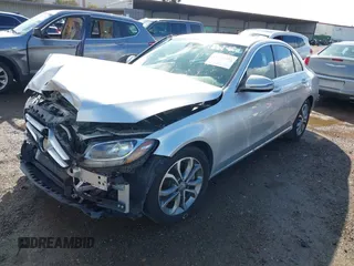 2016 Mercedes-Benz C with VIN 55SWF4JB6GU133923, listed as a IAAI auction lot 41720355 with 63,209 mi miles. Bid and sale history available at carsss.com. Image 2.