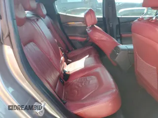 2014 Maserati Ghibli S Q4 z VIN ZAM57RTA6E1090293, wystawiony jako Copart lot #57298875 z przebiegiem 113 805 mil mil oraz Tytuł czysty. Historia ofert i sprzedaży dostępna na DreamBid. Obrazek 10.