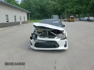 2016 Scion tC z VIN JTKJF5C73GJ024430, wystawiony jako Copart lot #59889055 z przebiegiem 142 532 mil mil oraz Szkoda całkowita • Salvage title. Historia ofert i sprzedaży dostępna na DreamBid. Obrazek 13.