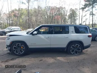 2023 Rivian R1S Launch Edition with VIN 7PDSGABL5PN006609, listed as a IAAI auction lot 41903200 with Not Provided miles. Bid and sale history available at carsss.com. Image 14.
