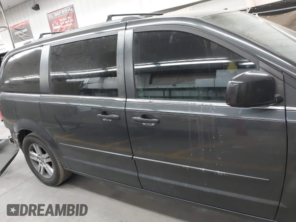 2011 Dodge Grand Caravan Crew with VIN 2D4RN5DG9BR683020, listed as a IAAI auction lot 42150221 with 200,730 mi miles and . Bid and sale history available at DreamBid. Image 13.