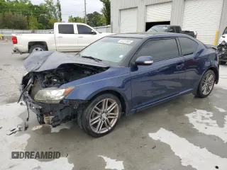 2013 Scion tC z VIN JTKJF5C79D3062325, wystawiony jako Copart lot #53340955 z przebiegiem Nie podano mil oraz Szkoda całkowita • Salvage title. Historia ofert i sprzedaży dostępna na DreamBid. Obrazek 1.