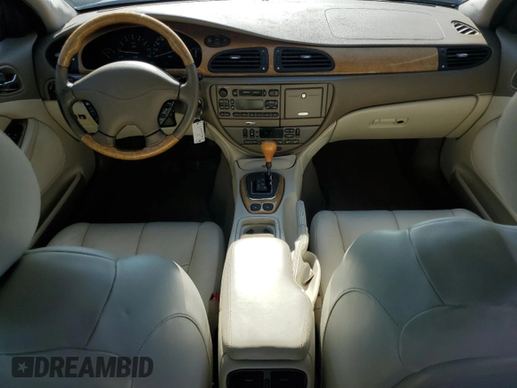 2002 Jaguar S-Type with VIN SAJDA01P52GM27504, listed as a Copart auction lot 57850944 with 119,707 mi miles and Clean Title. Bid and sale history available at DreamBid. Image 8.