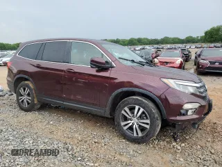 2017 Honda Pilot EX-L with VIN 5FNYF6H5XHB079081, listed as a Copart auction lot 54656305 with 197,010 mi miles and Salvage title. Bid and sale history available at DreamBid. Image 4.