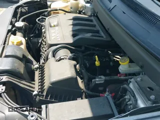 2013 Dodge Journey SE z VIN 3C4PDCAB3DT552847, wystawiony jako IAAI lot #42409901 z przebiegiem 97 482 mil mil oraz . Historia ofert i sprzedaży dostępna na DreamBid. Obrazek 12.