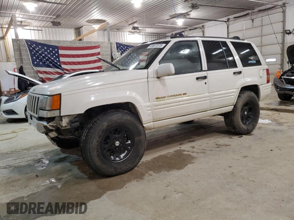 1997 Jeep Grand Cherokee Limited with VIN 1J4GZ78Y5VC747553, listed as a Copart auction lot 49125085 with 0 mi miles and Salvage Title. Bid and sale history available at carsss.com. Image 1.