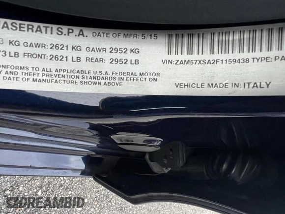 2015 Maserati Ghibli z VIN ZAM57XSA2F1159438, wystawiony jako Copart lot #49187735 z przebiegiem 73 996 mil mil oraz Szkoda całkowita • Salvage title. Historia ofert i sprzedaży dostępna na DreamBid. Obrazek 10.