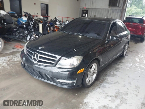 2014 Mercedes-Benz C 250 Sport with VIN WDDGF4HB4ER309280, listed as a IAAI auction lot 42351858 with 95,417 mi miles and . Bid and sale history available at DreamBid. Image 2.