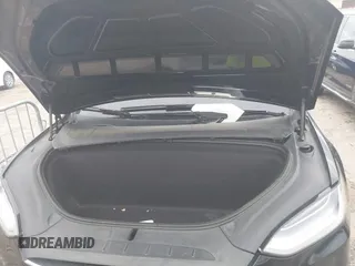 2021 Tesla Model X Long Range Plus with VIN 5YJXCAE27MF324270, listed as a IAAI auction lot 41886101 with 59,614 mi miles and . Bid and sale history available at carsss.com. Image 10.