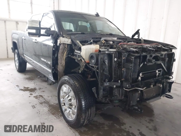 2016 GMC Sierra 2500HD Denali z VIN 1GT12UE82GF207890, wystawiony jako IAAI lot #41994971 z przebiegiem 101 221 mil mil oraz . Historia ofert i sprzedaży dostępna na DreamBid. Obrazek 1.