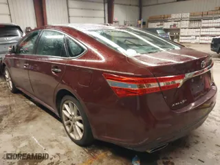 2013 Toyota Avalon XLE with VIN 4T1BK1EB0DU059112, listed as a IAAI auction lot 41553083 with 137,544 mi miles. Bid and sale history available at carsss.com. Image 3.
