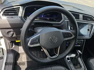 2024 Volkswagen Tiguan SE with VIN 3VV3B7AX5RM086820, listed as a IAAI auction lot 42751180 with 30,839 mi miles and . Bid and sale history available at DreamBid. Image 2.