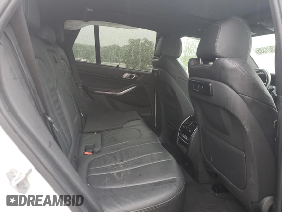 2019 BMW X5 xDrive40i z VIN 5UXCR6C56KLL40086, wystawiony jako Copart lot #58301335 z przebiegiem Nie podano mil oraz Szkoda całkowita • Salvage title. Historia ofert i sprzedaży dostępna na DreamBid. Obrazek 11.