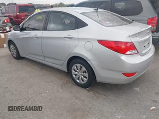 2015 Hyundai Accent GLS with VIN KMHCT4AE7FU930948, listed as a IAAI auction lot 42171213 with 150,543 mi miles and . Bid and sale history available at carsss.com. Image 3.