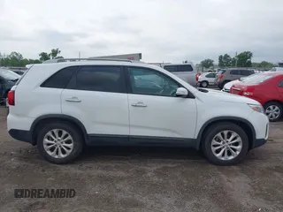 2015 Kia Sorento EX with VIN 5XYKU4A71FG647090, listed as a IAAI auction lot 42100215 with 121,842 mi miles. Bid and sale history available at carsss.com. Image 14.