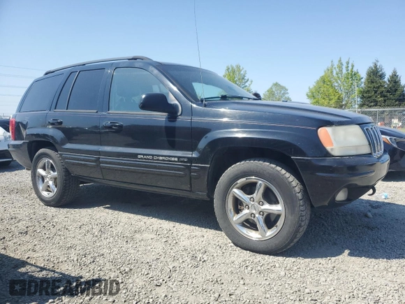 2002 Jeep Grand Cherokee Limited with VIN 1J8GW58NX2C158544, listed as a Copart auction lot 54937665 with 259,089 mi miles and Salvage title. Bid and sale history available at DreamBid. Image 4.