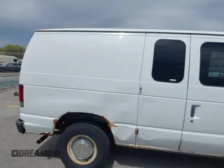 2004 Ford Econoline Cargo with VIN 1FTNE24W84HB38152, listed as a IAAI auction lot 42090193 with 102,357 mi miles. Bid and sale history available at carsss.com. Image 14.