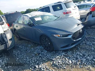 2025 Mazda 3 S Carbon Edition with VIN 3MZBPBCM4SM467451, listed as a IAAI auction lot 42483212 with Not provided miles and . Bid and sale history available at DreamBid. Image 1.