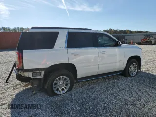 2020 GMC Yukon SLT with VIN 1GKS1BKC2LR248912, listed as a Copart auction lot 79935584 with 100,313 mi miles and Salvage Title. Bid and sale history available at DreamBid. Image 3.