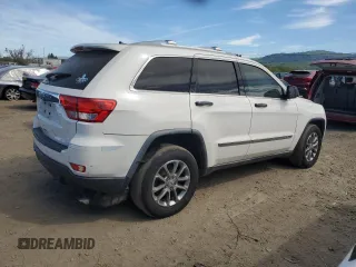 2012 Jeep Grand Cherokee Laredo with VIN 1C4RJEAG0CC222943, listed as a Copart auction lot 52899545 with 153,389 mi miles and Salvage Title. Bid and sale history available at carsss.com. Image 3.
