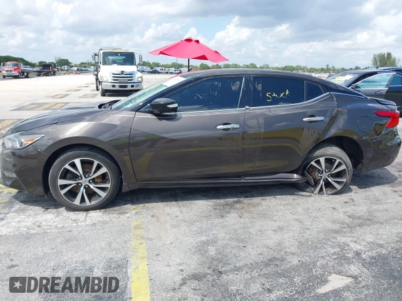 2016 Nissan Maxima SR with VIN 1N4AA6AP9GC405420, listed as a IAAI auction lot 41933739 with 59,680 mi miles and . Bid and sale history available at DreamBid. Image 6.