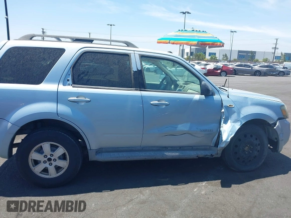2008 Mercury Mariner with VIN 4M2CU81198KJ06044, listed as a IAAI auction lot 42466023 with 165,545 mi miles and . Bid and sale history available at DreamBid. Image 13.