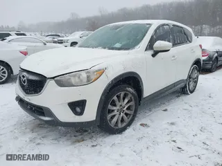 2015 Mazda CX-5 Grand Touring with VIN JM3KE2DY5F0451690, listed as a IAAI auction lot 41570379 with NaN miles. Bid and sale history available at carsss.com. Image 16.