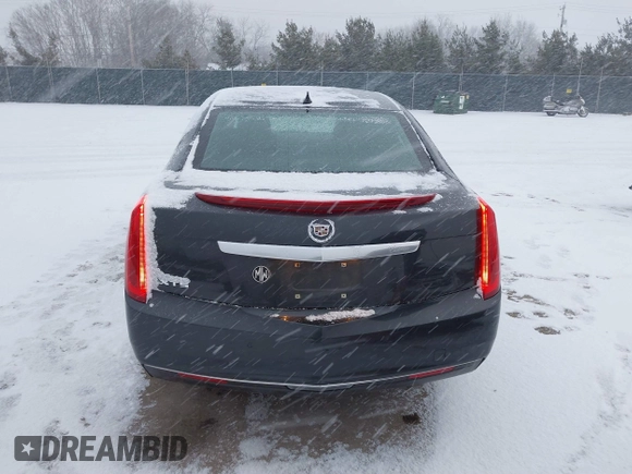 2013 Cadillac XTS with VIN 2G61N5S37D9112979, listed as a IAAI auction lot 41209826 with 83,237 mi miles. Bid and sale history available at carsss.com. Image 16.