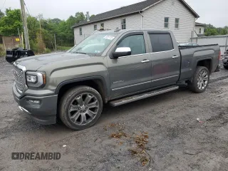 2017 GMC Sierra 1500 Denali z VIN 3GTU2PEJ1HG293825, wystawiony jako Copart lot #56851725 z przebiegiem 91 439 mil mil oraz Szkoda całkowita • Salvage title. Historia ofert i sprzedaży dostępna na DreamBid. Obrazek 1.