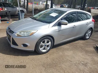 2013 Ford Focus SE with VIN 1FADP3K2XDL104907, listed as a IAAI auction lot 41952204 with 136,970 mi miles. Bid and sale history available at carsss.com. Image 2.