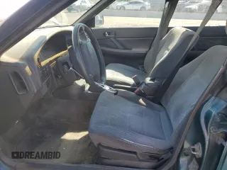 1994 Subaru Legacy L with VIN 4S3BJ6337R7955431, listed as a Copart auction lot 70200794 with 281,694 mi miles and Salvage Title. Bid and sale history available at DreamBid. Image 7.