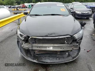 2013 Ford Taurus SHO with VIN 1FAHP2KT6DG211496, listed as a Copart auction lot 63424445 with 123,742 mi miles and Salvage title. Bid and sale history available at DreamBid. Image 5.