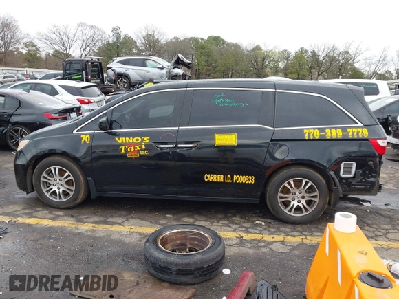 2012 Honda Odyssey EX-L with VIN 5FNRL5H64CB142247, listed as a IAAI auction lot 41722015 with 179,637 mi miles and . Bid and sale history available at carsss.com. Image 14.