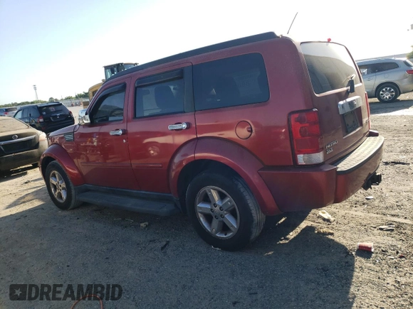 2007 Dodge Nitro SLT z VIN 1D8GU58KX7W569839, wystawiony jako Copart lot #53720705 z przebiegiem 175 746 mil mil oraz Czysty tytuł • Clean title. Historia ofert i sprzedaży dostępna na DreamBid. Obrazek 2.