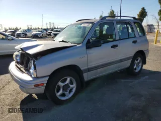 2002 Suzuki Vitara JLS z VIN 2S3TE52V126109079, wystawiony jako Copart lot #41477725 z przebiegiem 147 255 mil mil oraz Szkody całkowita. Historia ofert i sprzedaży dostępna na DreamBid. Obrazek 1.