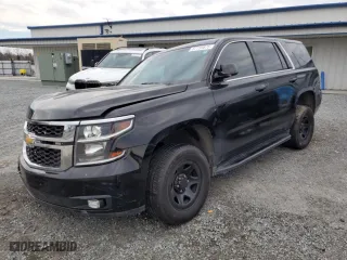 2016 Chevrolet Tahoe Commercial with VIN 1GNLCDEC1GR291328, listed as a Copart auction lot 87735875 with 113,746 mi miles and Salvage Title. Bid and sale history available at carsss.com. Image 1.