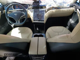 2013 Tesla Model S with VIN 5YJSA1CN1DFP26864, listed as a Copart auction lot 52029485 with 63,260 mi miles and Salvage Title. Bid and sale history available at DreamBid. Image 8.