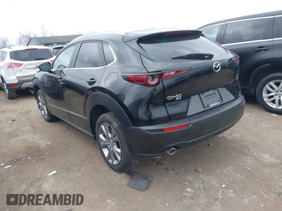 2023 Mazda CX-30 S Carbon Edition with VIN 3MVDMBCMXPM553129, listed as a IAAI auction lot 41864876 with 18,317 mi miles and . Bid and sale history available at DreamBid. Image 3.