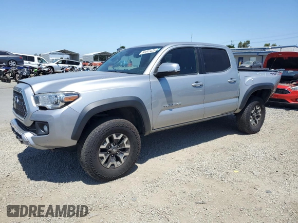 2018 Toyota Tacoma SR with VIN 3TMCZ5AN6JM129370, listed as a Copart auction lot 63042425 with 65,189 mi miles and Salvage title. Bid and sale history available at DreamBid. Image 1.