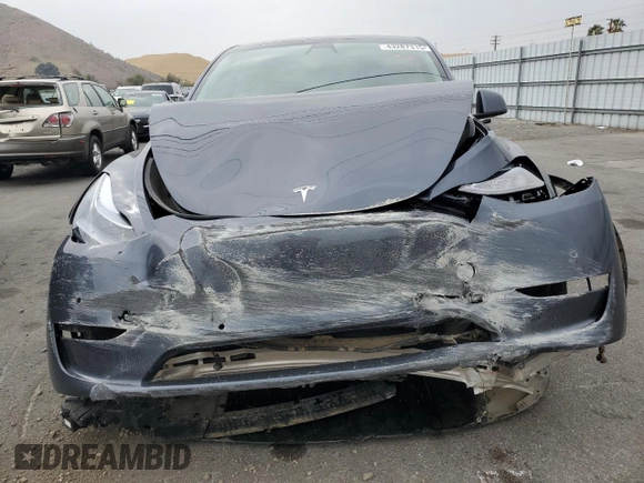 2022 Tesla Model Y Performance z VIN 7SAYGDEF1NF457494, wystawiony jako Copart lot #43287315 z przebiegiem 79 855 mil mil oraz Szkoda całkowita • Salvage title. Historia ofert i sprzedaży dostępna na DreamBid. Obrazek 5.