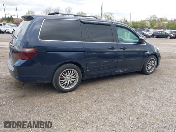 2007 Honda Odyssey EX-L with VIN 5FNRL38737B031255, listed as a IAAI auction lot 42040035 with 233,369 mi miles. Bid and sale history available at carsss.com. Image 4.